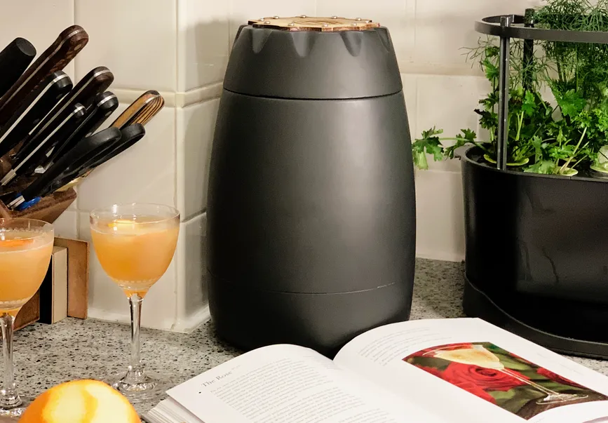 Finished simulated whiskey aging device in a home kitchen