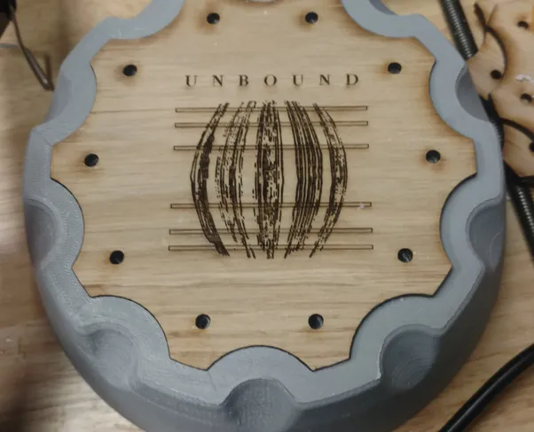 White oak lid and pressure locking detail on the prototype device